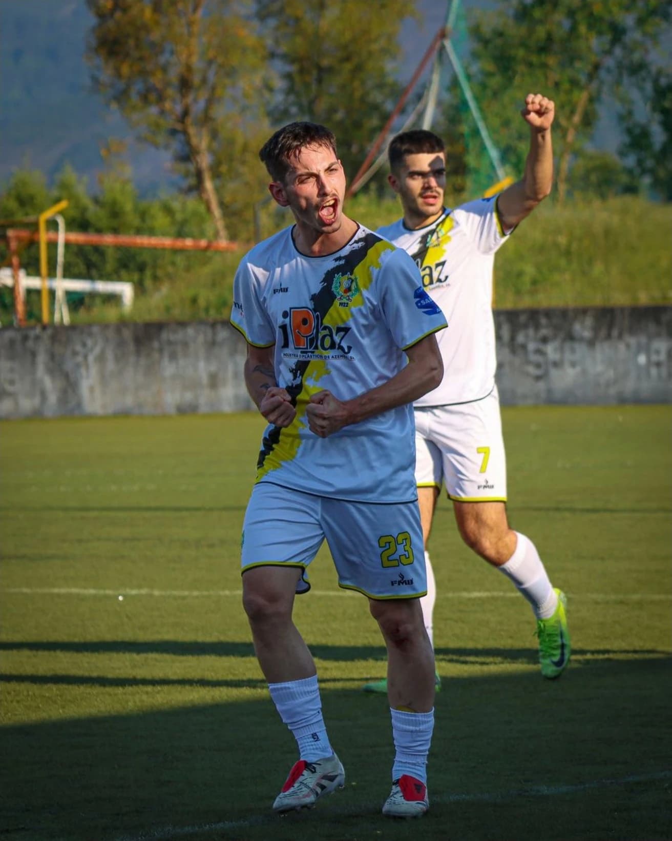 Celebração de um jogador após um lance